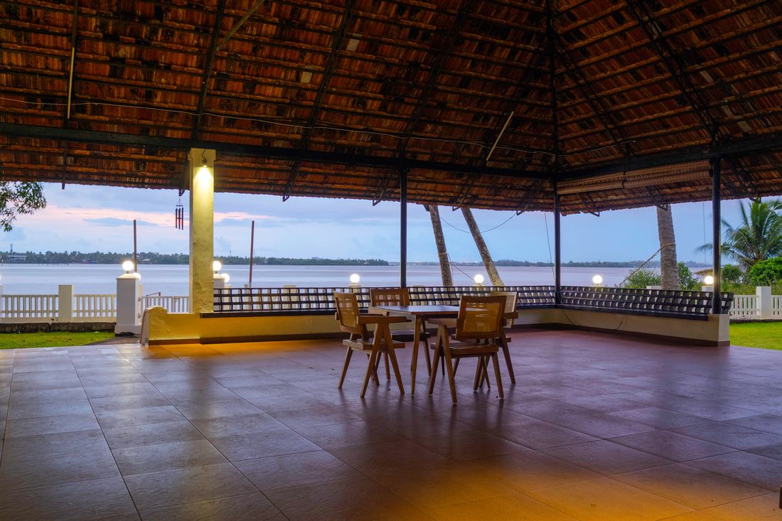 Warm evening light across the pandal interior